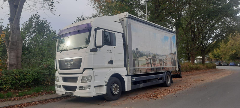 MAN TGX 18.360PS 4x2 G.Haus Kran+Funk - Kamion sa ceradom, Kamion sa dizalicom: slika 1 MAN TGX 18.360PS 4x2 G.Haus Kran+Funk - Kamion sa ceradom, Kamion sa dizalicom: slika 1