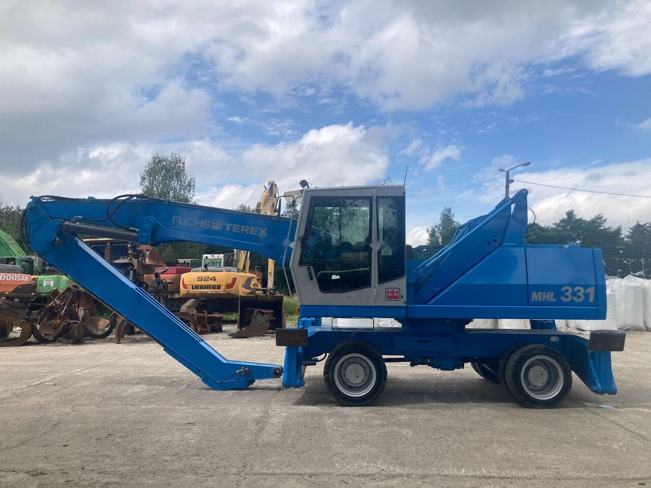 Fuchs MHL 331 C with Generator - Bager za obradu otpada/ Industrije: slika 1 Fuchs MHL 331 C with Generator - Bager za obradu otpada/ Industrije: slika 1