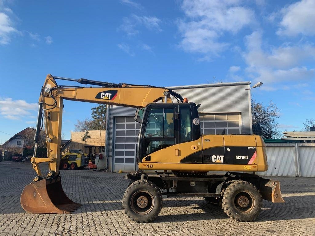 CAT M 316 D - Bager točkaš: slika 2 CAT M 316 D - Bager točkaš: slika 2