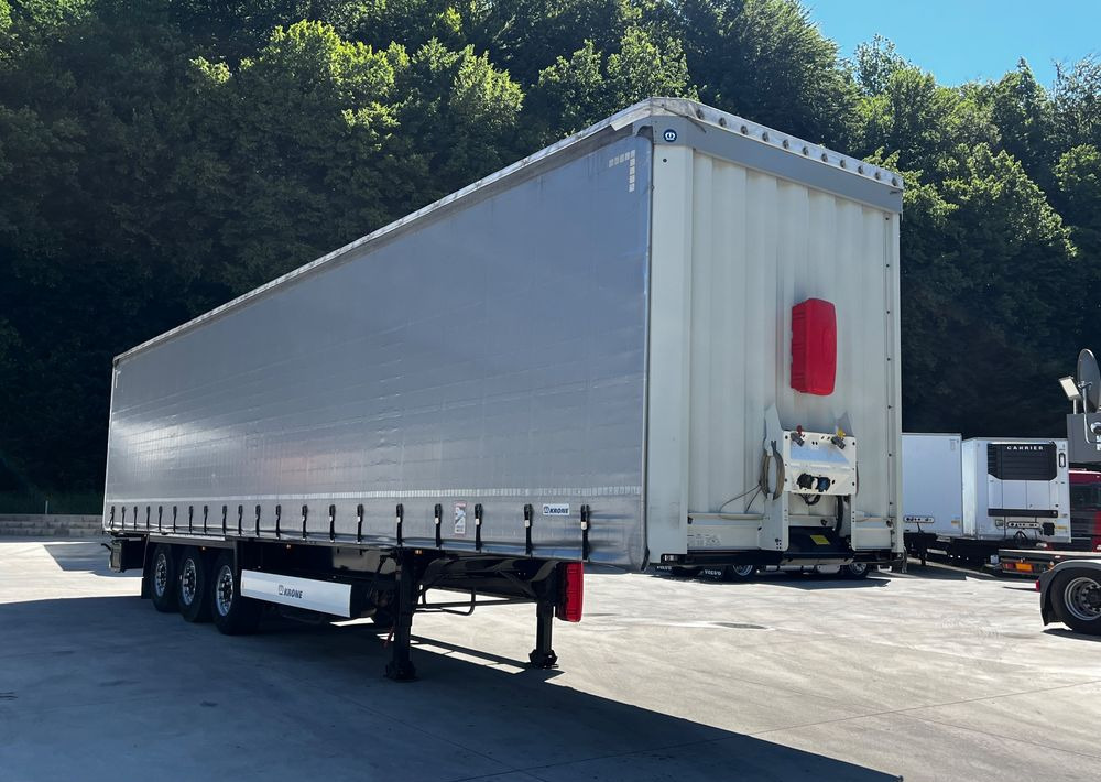 Krone Firanka Coilmulde // 9m // Alu Drzwi // Ażury // Oś podnoszona // - Poluprikolica sa ceradom: slika 4 Krone Firanka Coilmulde // 9m // Alu Drzwi // Ażury // Oś podnoszona // - Poluprikolica sa ceradom: slika 4