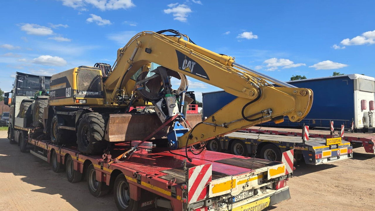Caterpillar M312 Koparka PrzeŁAdunkowa Czerpak Świeżo Sprowadz ona - Bager točkaš: slika 1 Caterpillar M312 Koparka PrzeŁAdunkowa Czerpak Świeżo Sprowadz ona - Bager točkaš: slika 1