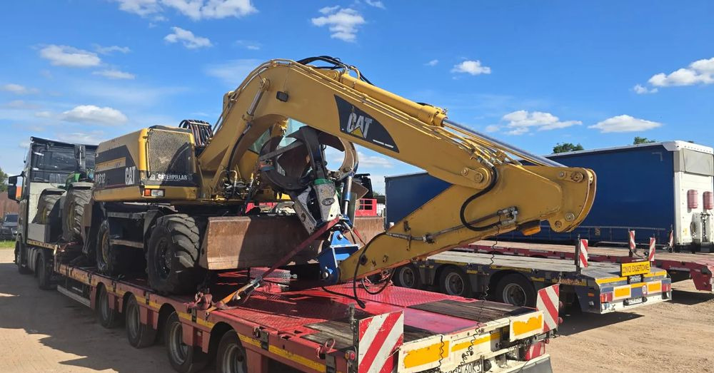 Caterpillar M312 - Bager točkaš: slika 1 Caterpillar M312 - Bager točkaš: slika 1