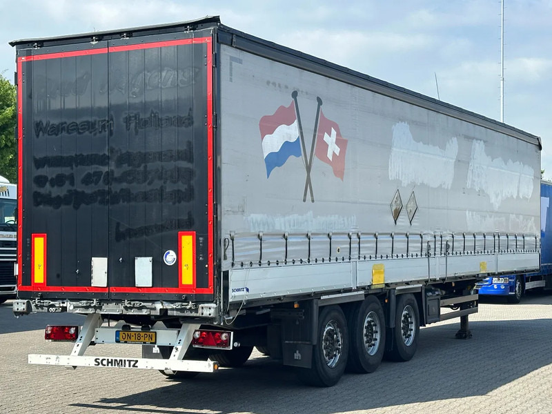 Schmitz Cargobull Schuifzeil met Borden / Disc-Brakes / Huckepack / Code XL - Poluprikolica sa ceradom: slika 1 Schmitz Cargobull Schuifzeil met Borden / Disc-Brakes / Huckepack / Code XL - Poluprikolica sa ceradom: slika 1
