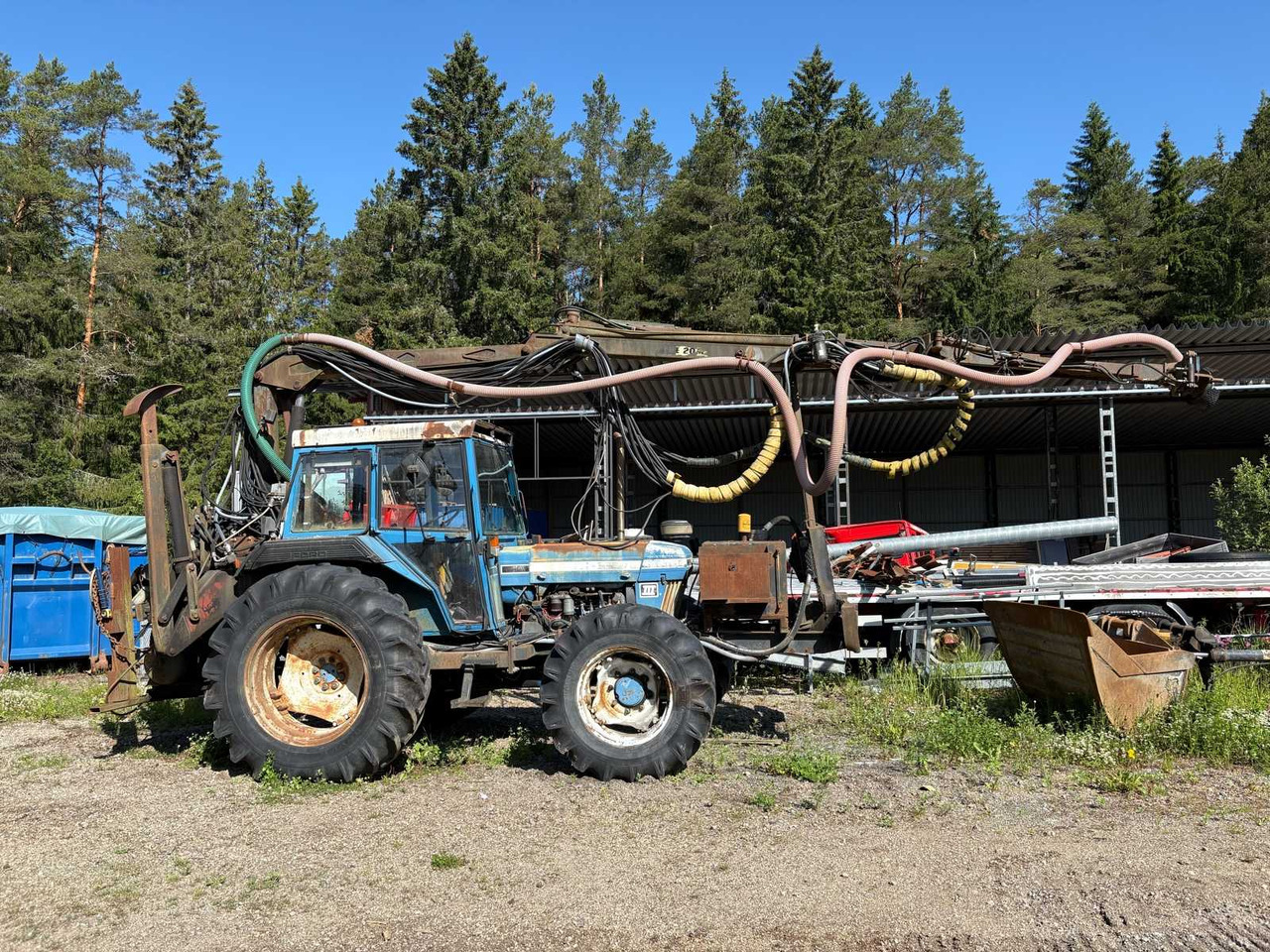 Rock drill Doofor DF530S and Tractor Ford New Holland 5610 - Veliki kamon za bušenje: slika 1 Rock drill Doofor DF530S and Tractor Ford New Holland 5610 - Veliki kamon za bušenje: slika 1