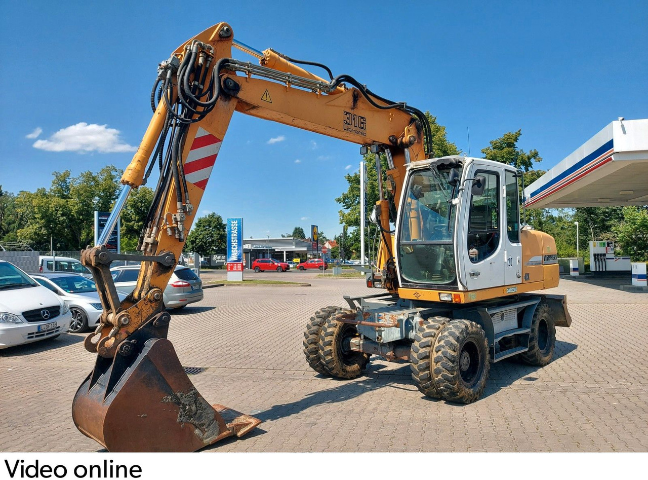 Liebherr A 316 LITRONIC TL + 2005 DEUTZ 13400 STD. Liebherr A 316 LITRONIC TL + 2005 DEUTZ 13400 STD. - Bager točkaš: slika 2 Liebherr A 316 LITRONIC TL + 2005 DEUTZ 13400 STD. Liebherr A 316 LITRONIC TL + 2005 DEUTZ 13400 STD. - Bager točkaš: slika 2