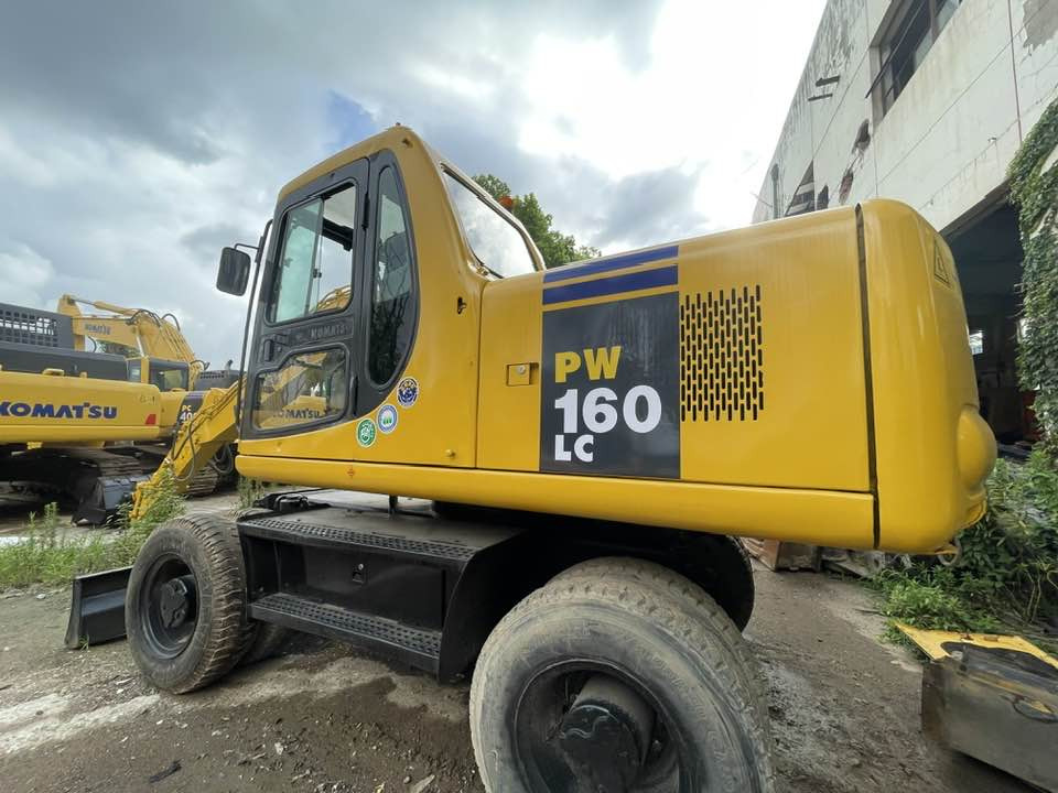 Komatsu PC160LC - Bager točkaš: slika 1 Komatsu PC160LC - Bager točkaš: slika 1