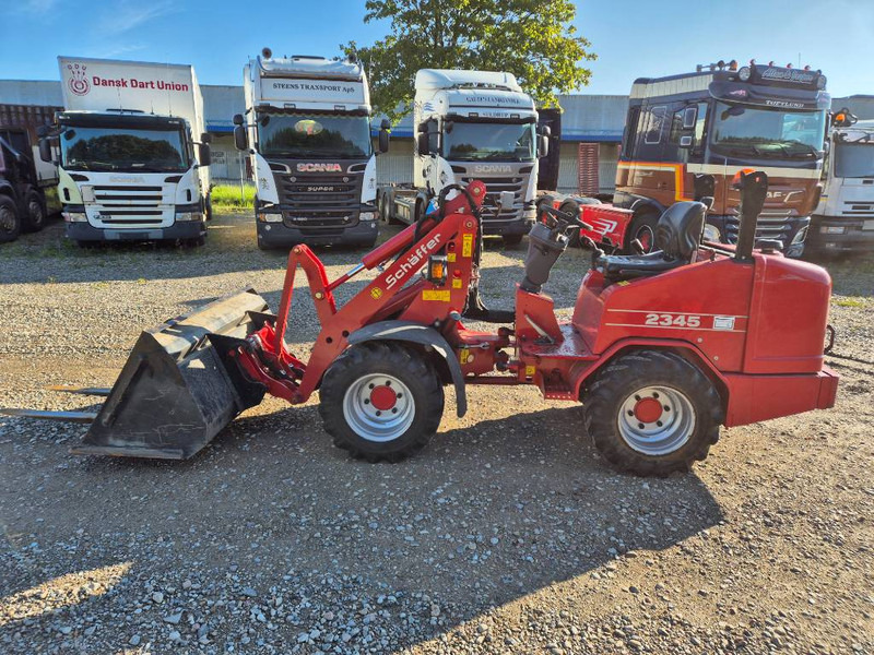 Schäffer 2345 (Bucket/Forks) - Kompaktni utovarivač guseničar: slika 1 Schäffer 2345 (Bucket/Forks) - Kompaktni utovarivač guseničar: slika 1