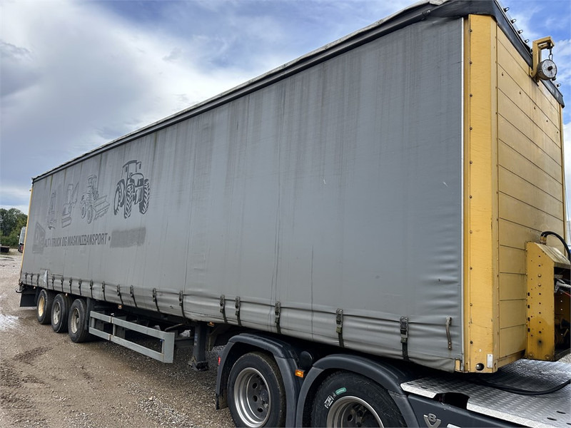 Schmitz Cargobull Machine transport trailer with bag ramp - Niska poluprikolica za prevoz: slika 4 Schmitz Cargobull Machine transport trailer with bag ramp - Niska poluprikolica za prevoz: slika 4