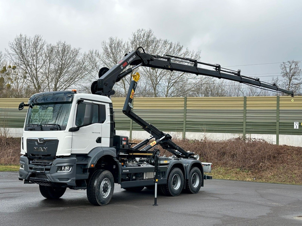 MAN TGS 33.440 6x6 BB Abrollkipper+Kran Hiab 228-6 - Kamion sa hidrauličnom kukom, Kamion sa dizalicom: slika 1 MAN TGS 33.440 6x6 BB Abrollkipper+Kran Hiab 228-6 - Kamion sa hidrauličnom kukom, Kamion sa dizalicom: slika 1