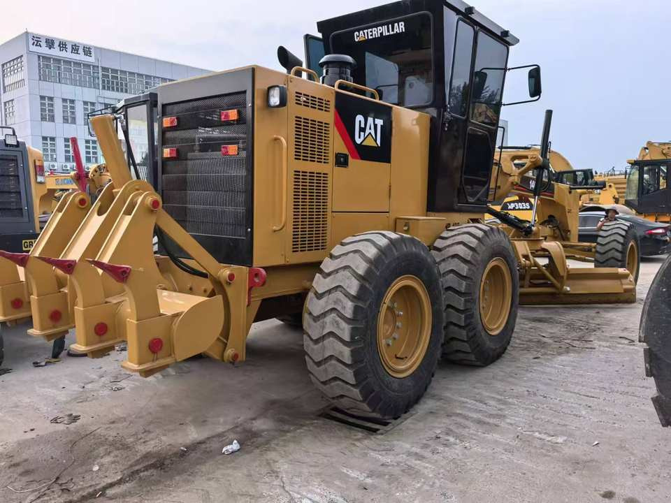 Second Hand Used Construction Machinery Japanese CAT 140G Grader Caterpillar Brand for Sale With Good Condition and Price - Grejder: slika 5 Second Hand Used Construction Machinery Japanese CAT 140G Grader Caterpillar Brand for Sale With Good Condition and Price - Grejder: slika 5