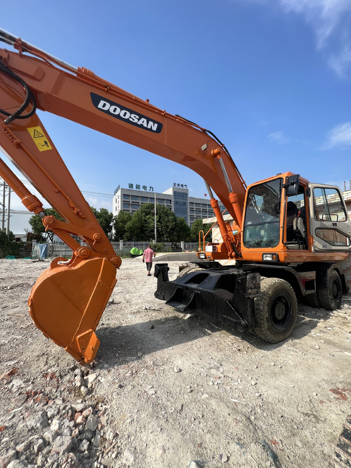 DOOSAN DX210 - Bager točkaš: slika 1 DOOSAN DX210 - Bager točkaš: slika 1