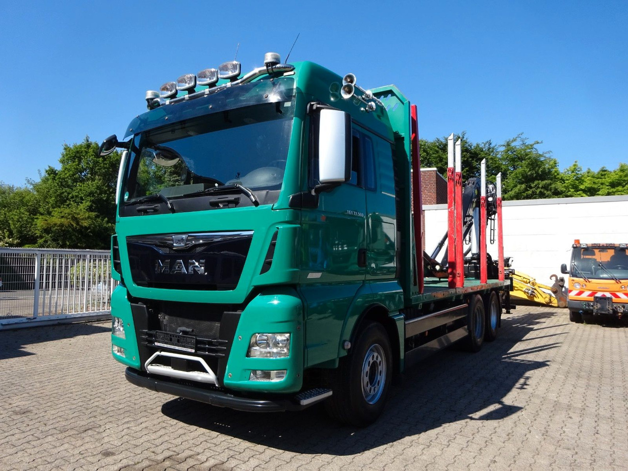 MAN 33.560 TGX mit TAJFUN L150Z Holzladekran 6x4 - Šticar, Kamion sa dizalicom: slika 1 MAN 33.560 TGX mit TAJFUN L150Z Holzladekran 6x4 - Šticar, Kamion sa dizalicom: slika 1