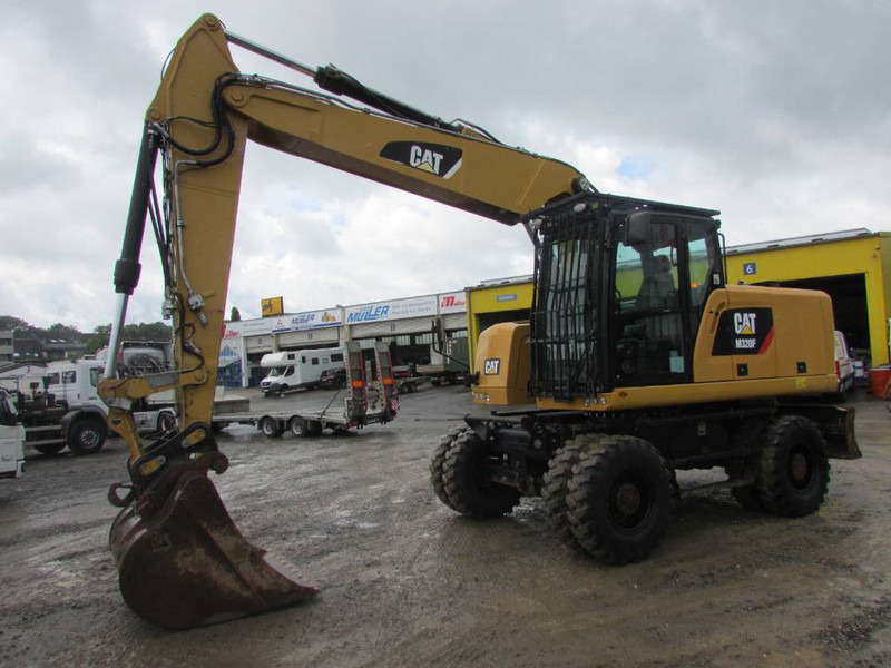 Cat M 320 F Mobilbagger 69.500 EUR / AC - Bager točkaš: slika 1 Cat M 320 F Mobilbagger 69.500 EUR / AC - Bager točkaš: slika 1