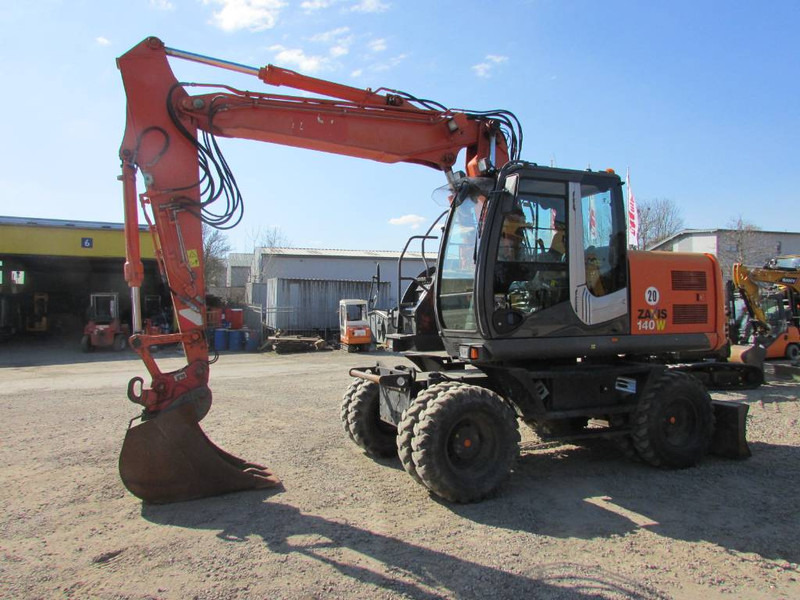 Hitachi ZX 140 W-3 Mobilbagger 45.000 EUR / Klima - Bager točkaš: slika 1 Hitachi ZX 140 W-3 Mobilbagger 45.000 EUR / Klima - Bager točkaš: slika 1