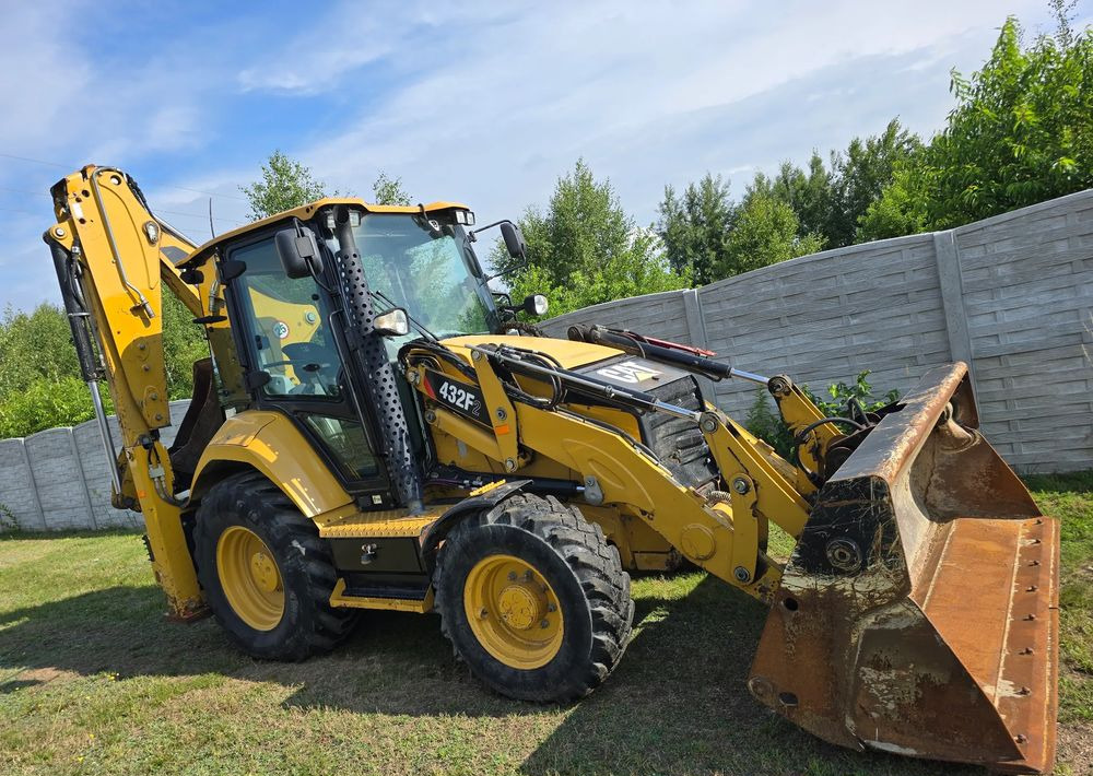 Caterpillar - Bager utovarivač: slika 2 Caterpillar - Bager utovarivač: slika 2