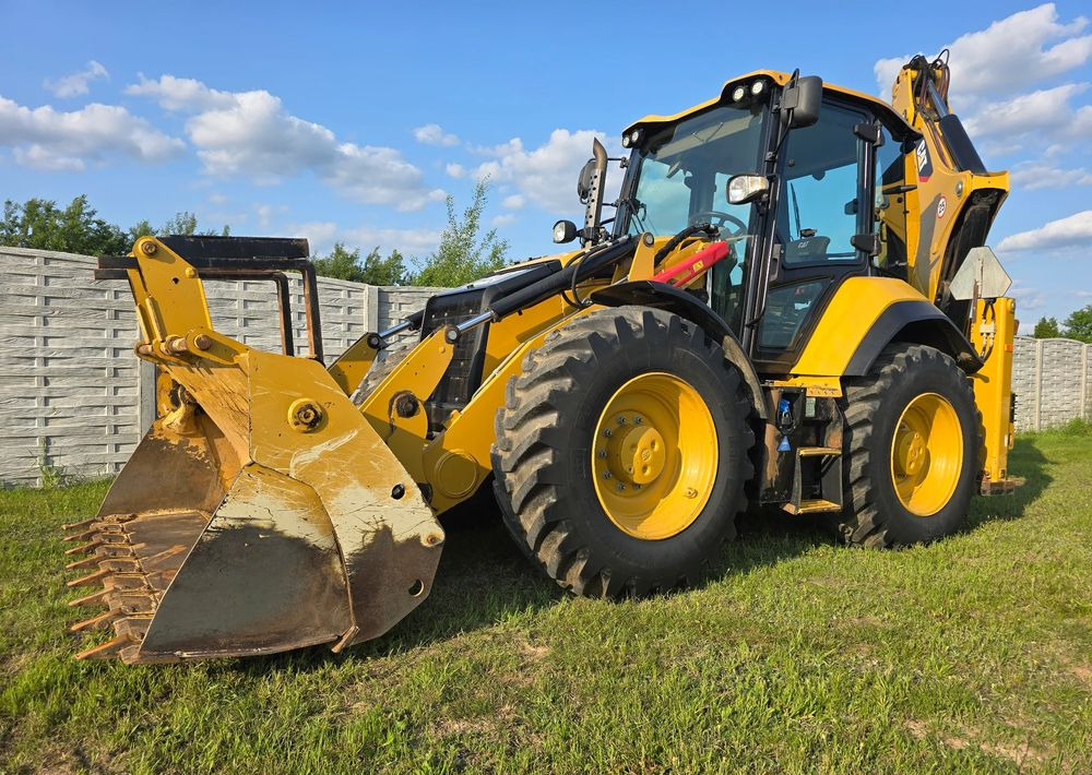 Caterpillar - Bager utovarivač: slika 1 Caterpillar - Bager utovarivač: slika 1