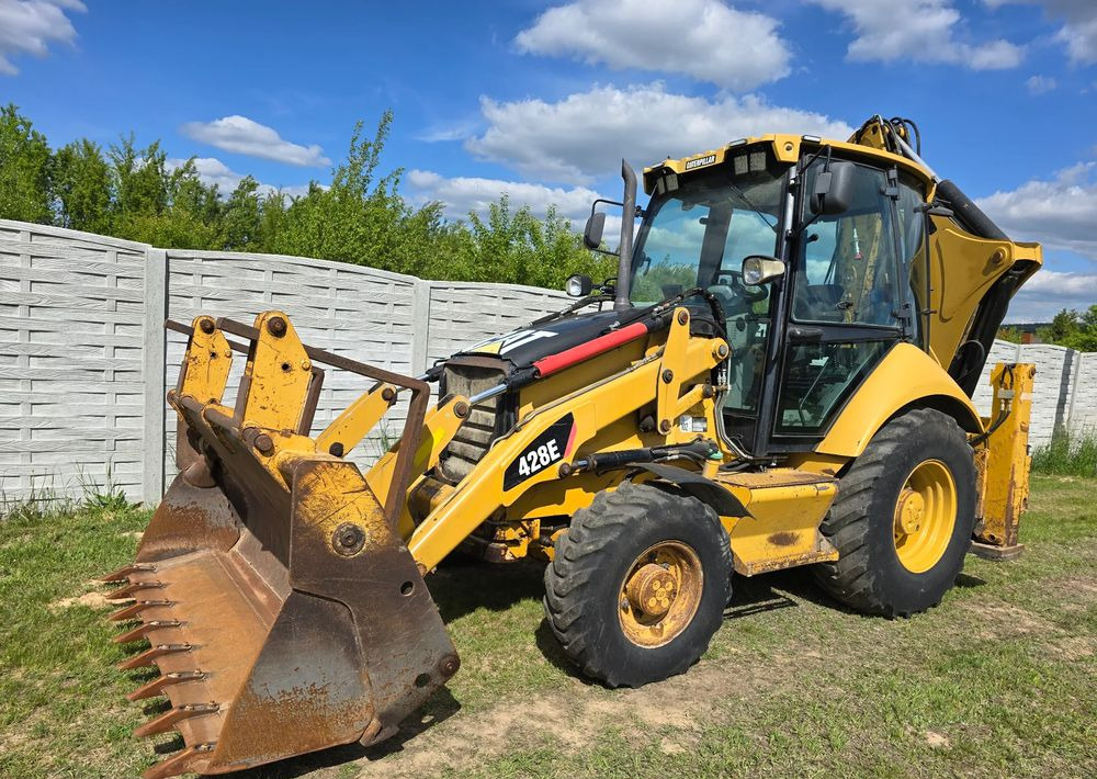 Caterpillar - Bager utovarivač: slika 2 Caterpillar - Bager utovarivač: slika 2