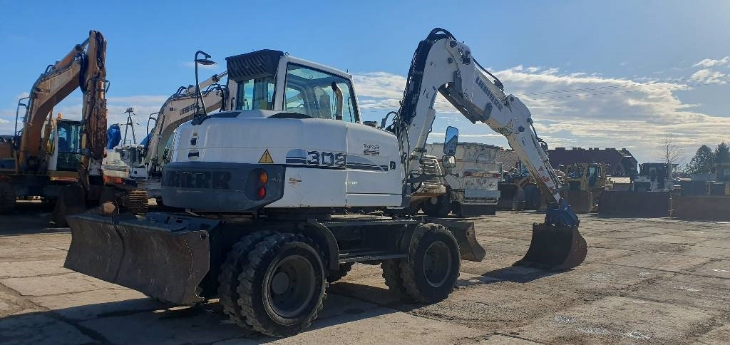 Liebherr A 309 Litronic - Bager točkaš: slika 3 Liebherr A 309 Litronic - Bager točkaš: slika 3