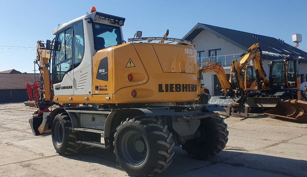 Liebherr A 912 compact - Bager točkaš: slika 2 Liebherr A 912 compact - Bager točkaš: slika 2