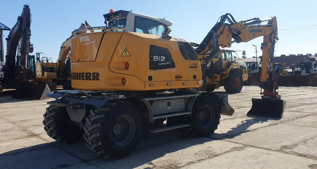 Liebherr A 912 compact - Bager točkaš: slika 4 Liebherr A 912 compact - Bager točkaš: slika 4