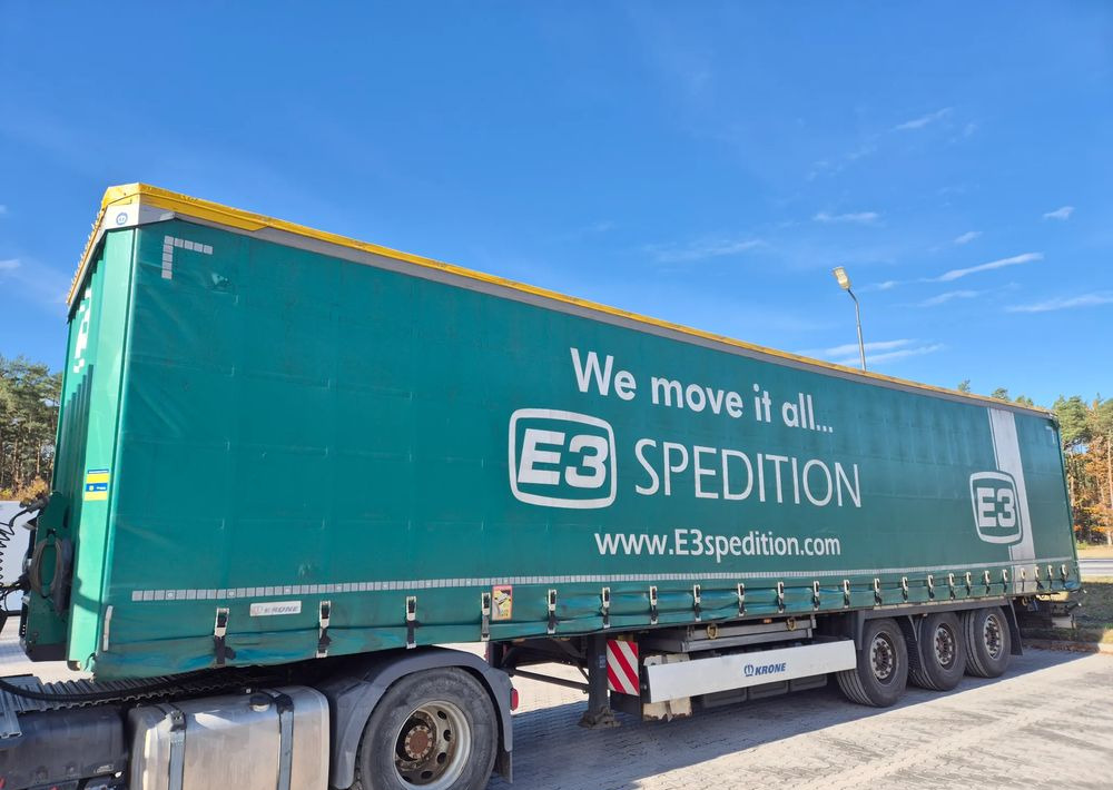 Krone BDE STANDARD PODNOSZONY DACH / z Niemiec PONADGABARYTY POSZERZANA OPONY 80% - Poluprikolica sa ceradom: slika 4 Krone BDE STANDARD PODNOSZONY DACH / z Niemiec PONADGABARYTY POSZERZANA OPONY 80% - Poluprikolica sa ceradom: slika 4