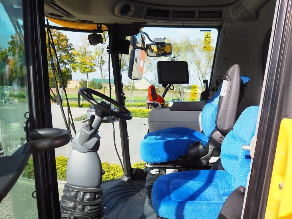 New Holland CR 9090 SmartTrax 4WD + VF 10,7 m  - Kombinovani kombajn: slika 5 New Holland CR 9090 SmartTrax 4WD + VF 10,7 m  - Kombinovani kombajn: slika 5