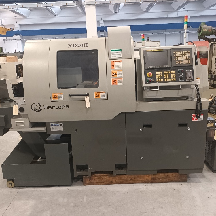 Tornio a fantina mobile a 5 assi Cnc Hanwha XD-20H - Strug za metal: slika 1 Tornio a fantina mobile a 5 assi Cnc Hanwha XD-20H - Strug za metal: slika 1