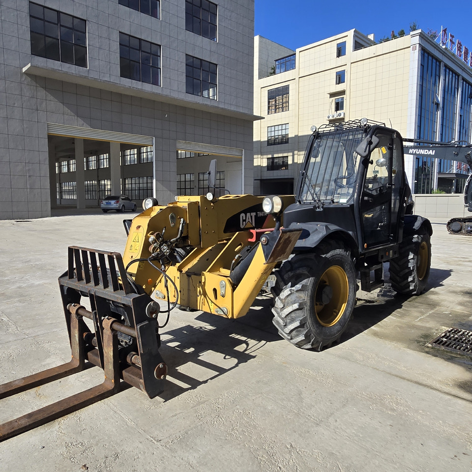 CATERPILLAR TH414 - Teleskopska platforma: slika 5 CATERPILLAR TH414 - Teleskopska platforma: slika 5
