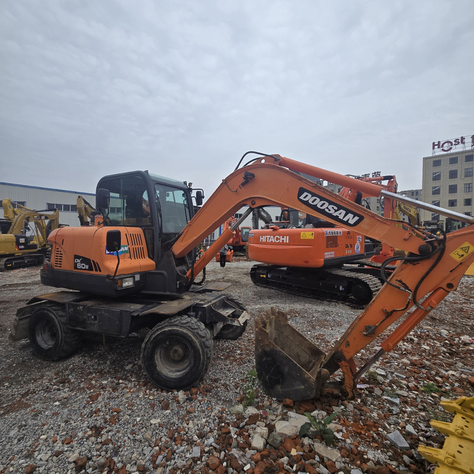 DOOSAN DX60W - Bager točkaš: slika 2 DOOSAN DX60W - Bager točkaš: slika 2