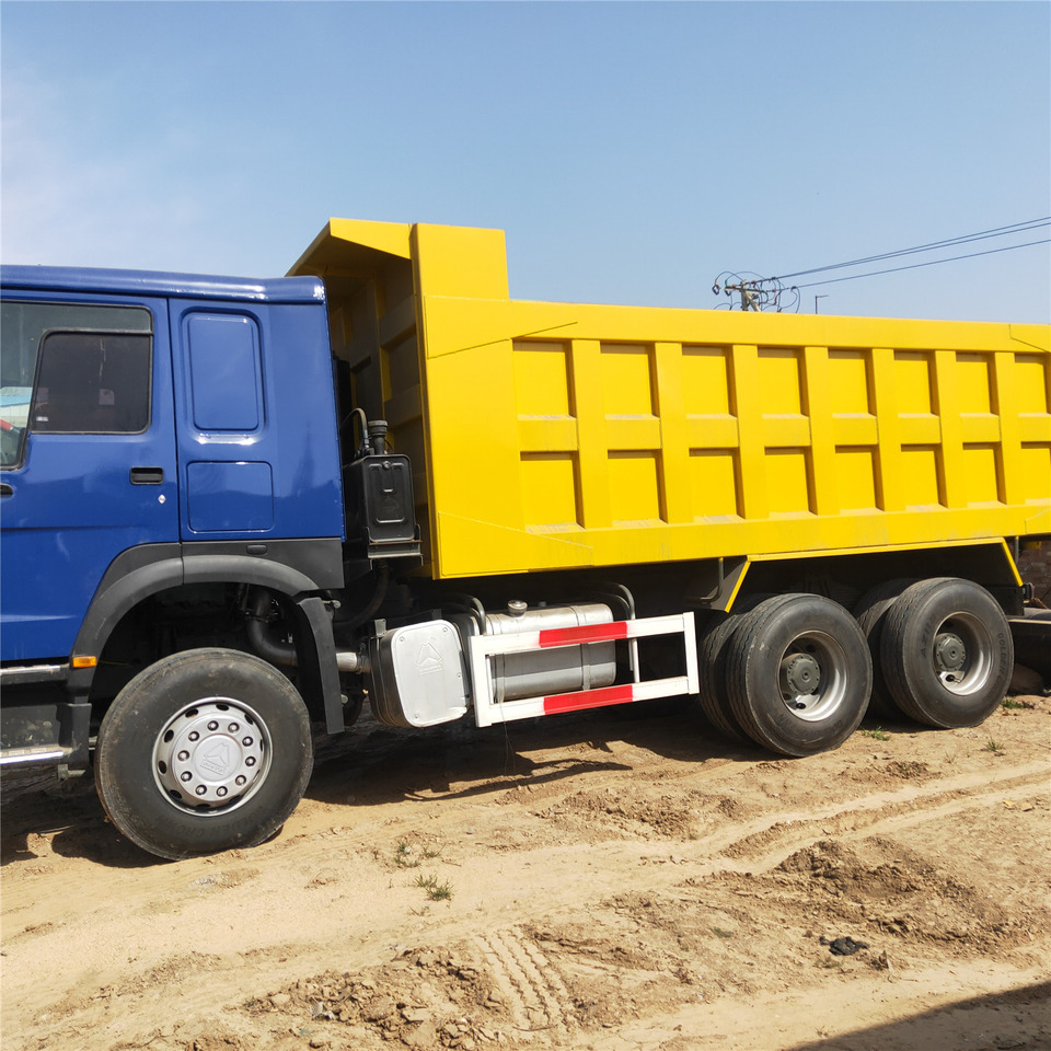 SINOTRUK HOWO - Istovarivač: slika 1 SINOTRUK HOWO - Istovarivač: slika 1