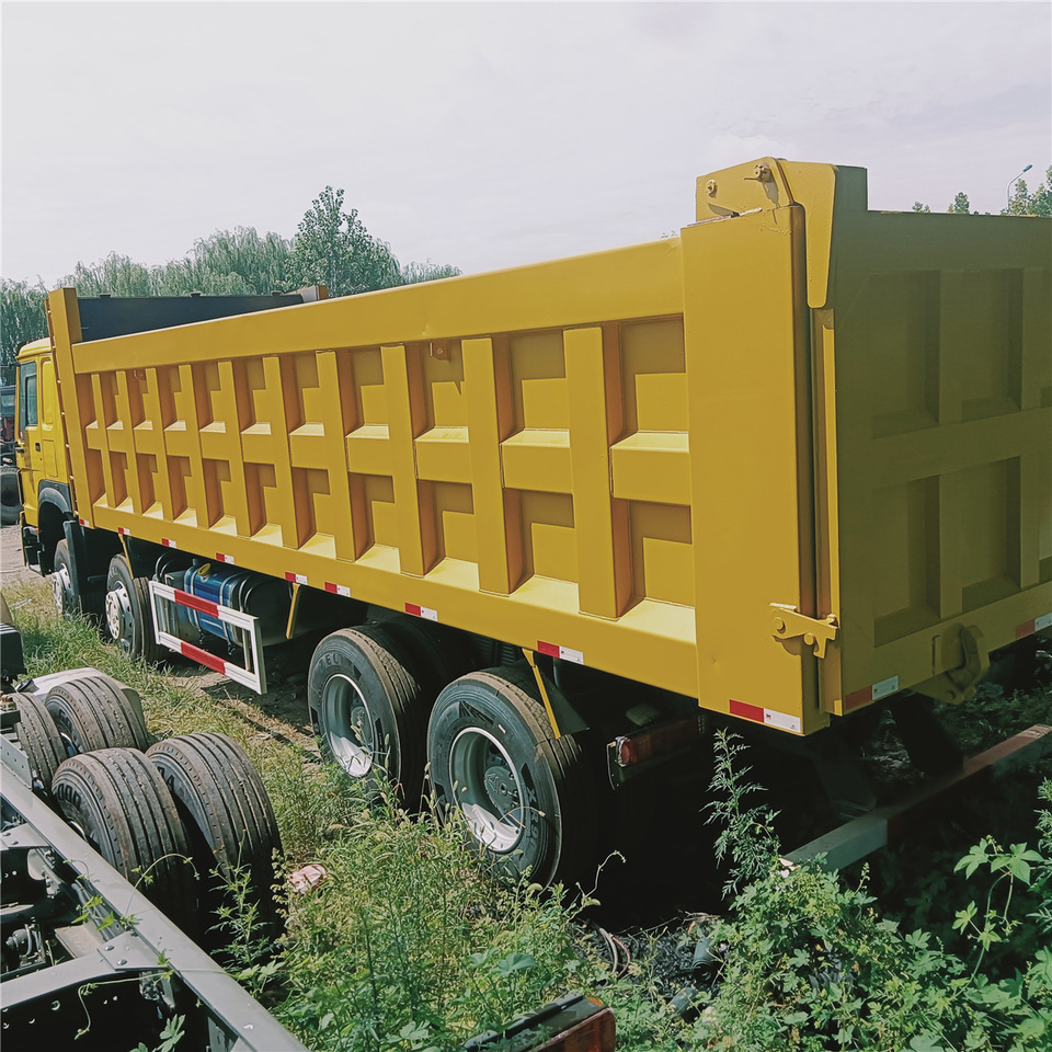 SINOTRUK Howo - Istovarivač: slika 1 SINOTRUK Howo - Istovarivač: slika 1