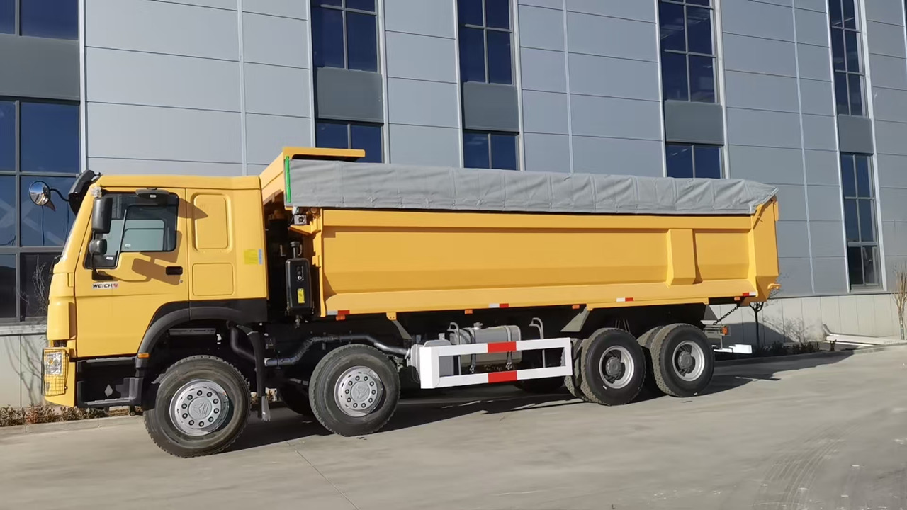 SINOTRUK Howo - Istovarivač: slika 1 SINOTRUK Howo - Istovarivač: slika 1