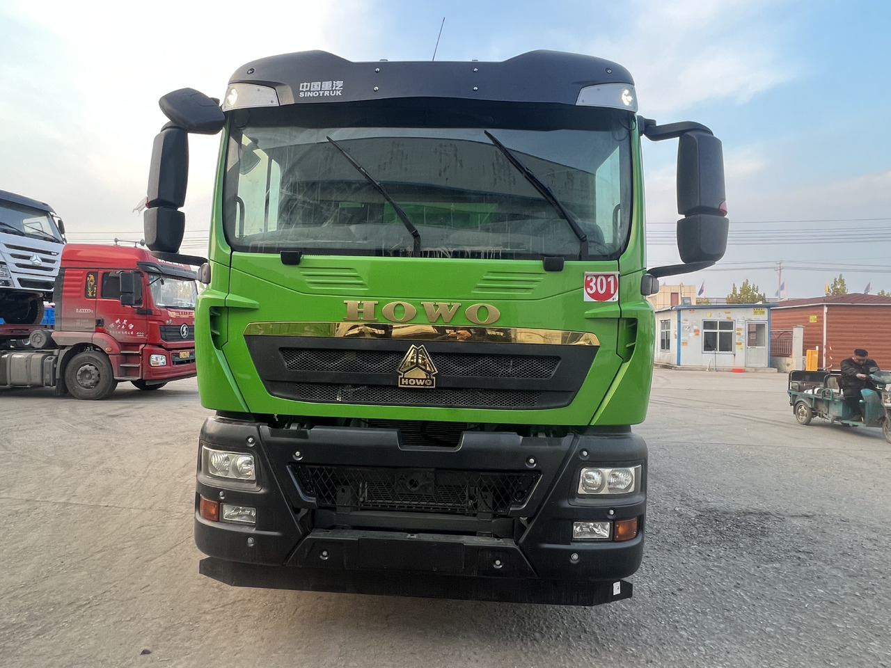 Sinotruk HOWO - Istovarivač: slika 1 Sinotruk HOWO - Istovarivač: slika 1
