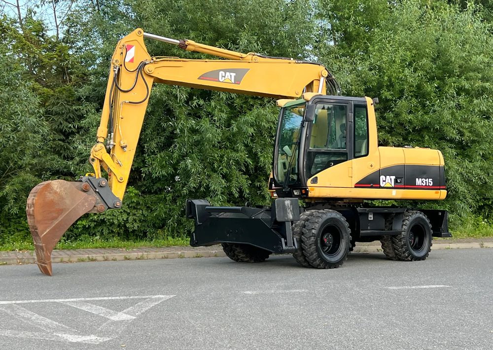 Caterpillar CAT M315C CATERPILLAR SPROWADZONY Bardzo Dobry Stan - Bager točkaš: slika 2 Caterpillar CAT M315C CATERPILLAR SPROWADZONY Bardzo Dobry Stan - Bager točkaš: slika 2