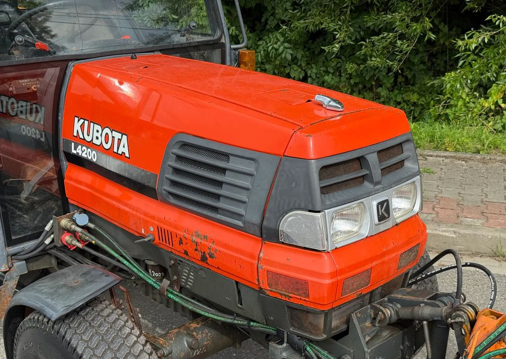 Kubota * Traktor KUBOTA L4200 * 4x4 * Pług Piaskarka * Wałek Przód Tył * Sprowadzony* Zimowe Utrzymanie - Traktor: slika 5 Kubota * Traktor KUBOTA L4200 * 4x4 * Pług Piaskarka * Wałek Przód Tył * Sprowadzony* Zimowe Utrzymanie - Traktor: slika 5