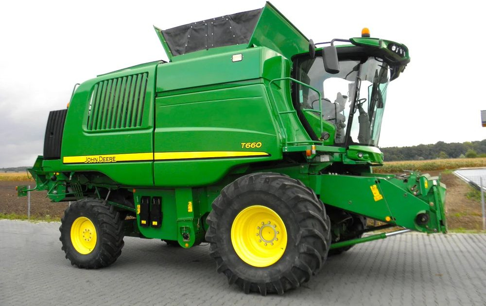 John Deere T660 2014 Rok, heder 7,6m, 2700 mtg na silniku, Najbogatsza Wersja, Nie Malowany, Stan Idealny - Kombinovani kombajn: slika 2 John Deere T660 2014 Rok, heder 7,6m, 2700 mtg na silniku, Najbogatsza Wersja, Nie Malowany, Stan Idealny - Kombinovani kombajn: slika 2