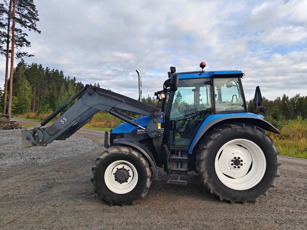 New Holland TS100, ES vaihteisto, ilmastointi, etukuormaaja Ålö Q55, katso video! - Traktor: slika 2 New Holland TS100, ES vaihteisto, ilmastointi, etukuormaaja Ålö Q55, katso video! - Traktor: slika 2