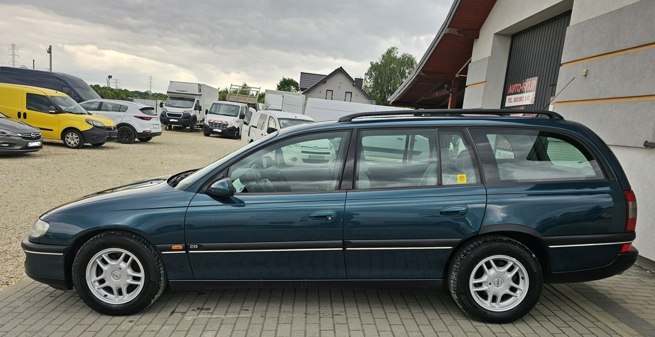 Opel Omega B 2,5 v6 *automat* napęd tył *welury* - Automobil: slika 4 Opel Omega B 2,5 v6 *automat* napęd tył *welury* - Automobil: slika 4