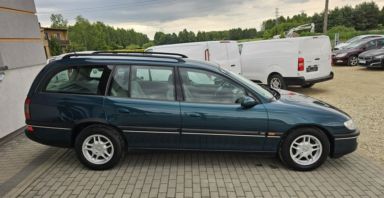 Opel Omega B 2,5 v6 *automat* napęd tył *welury* - Automobil: slika 5 Opel Omega B 2,5 v6 *automat* napęd tył *welury* - Automobil: slika 5