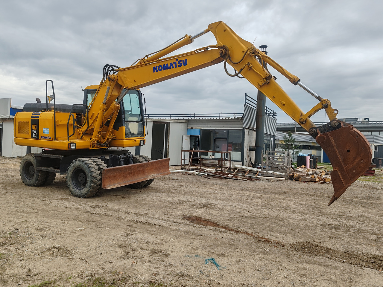 Komatsu PW140-7 - Bager točkaš: slika 2 Komatsu PW140-7 - Bager točkaš: slika 2