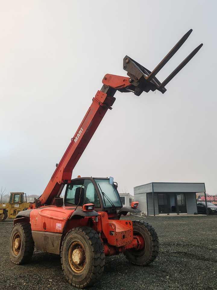 Manitou MHT 950 LT - Teleskopski utovarivač na točkovima: slika 1 Manitou MHT 950 LT - Teleskopski utovarivač na točkovima: slika 1