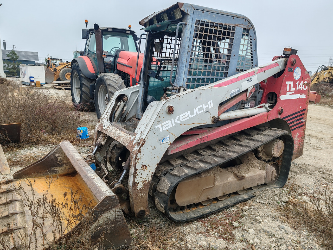 Takeuchi TL140 - Kompaktni utovarivač guseničar: slika 1 Takeuchi TL140 - Kompaktni utovarivač guseničar: slika 1