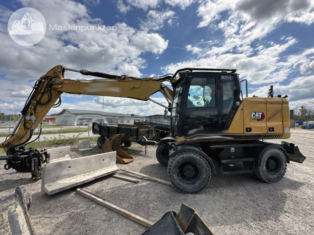 CAT M 314 - Bager točkaš: slika 1 CAT M 314 - Bager točkaš: slika 1