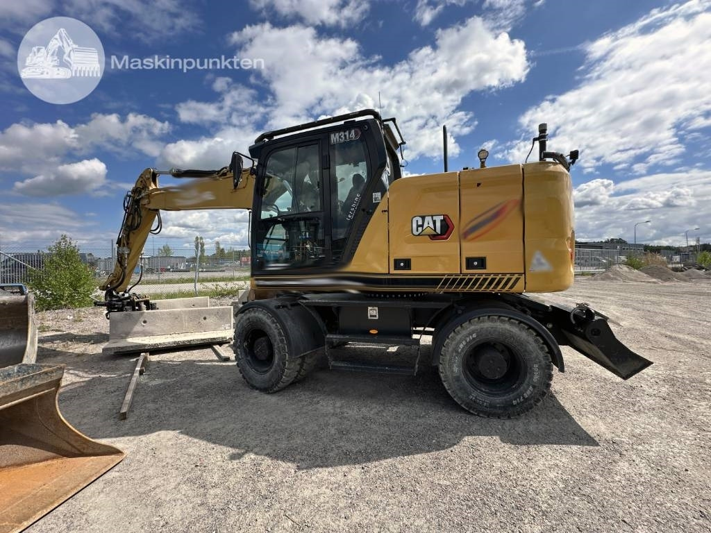 CAT M 314 - Bager točkaš: slika 1 CAT M 314 - Bager točkaš: slika 1