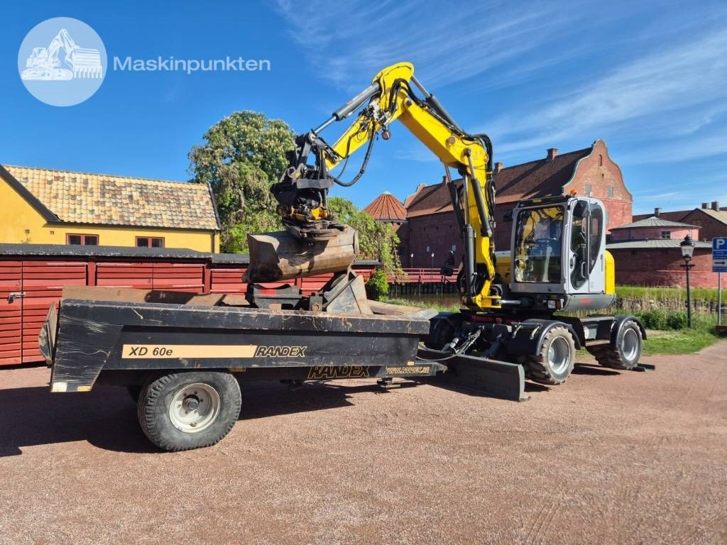 Wacker Neuson EW 100 med vagn - Bager točkaš: slika 1 Wacker Neuson EW 100 med vagn - Bager točkaš: slika 1