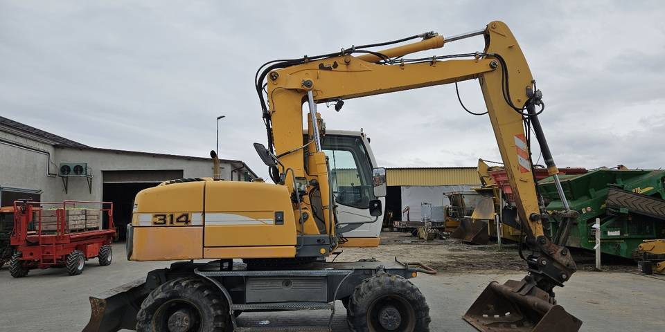 Koparka kołowa Liebherr A314 Litronic 9350 h 4 łyżki kołówka - Bager točkaš: slika 5 Koparka kołowa Liebherr A314 Litronic 9350 h 4 łyżki kołówka - Bager točkaš: slika 5