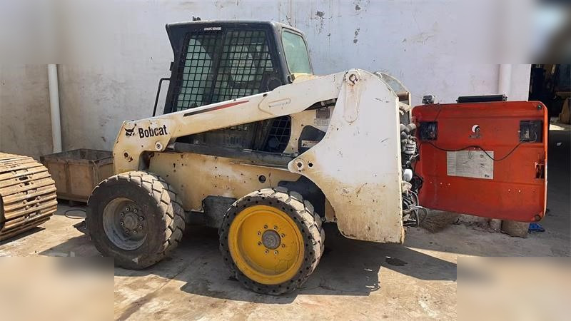BOBCAT S220 - Mini utovarivač: slika 1 BOBCAT S220 - Mini utovarivač: slika 1