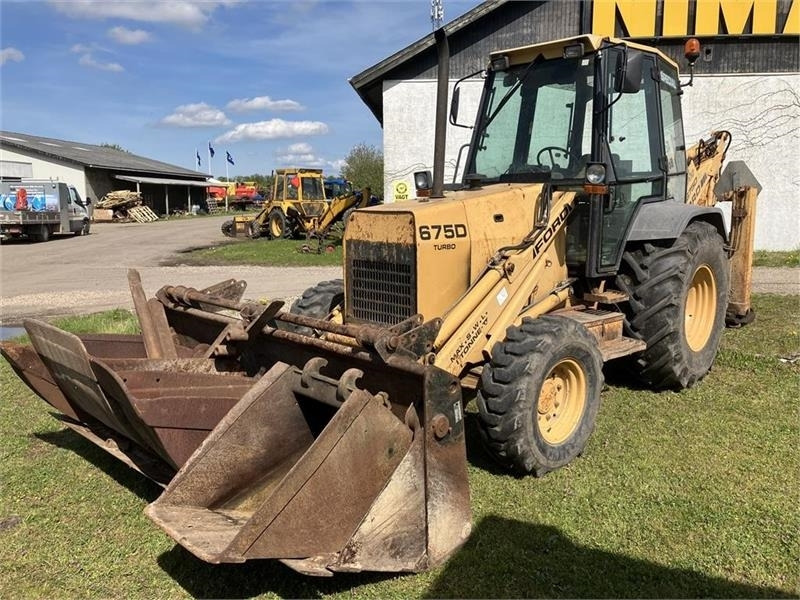 New Holland 675D - Bager utovarivač: slika 1 New Holland 675D - Bager utovarivač: slika 1