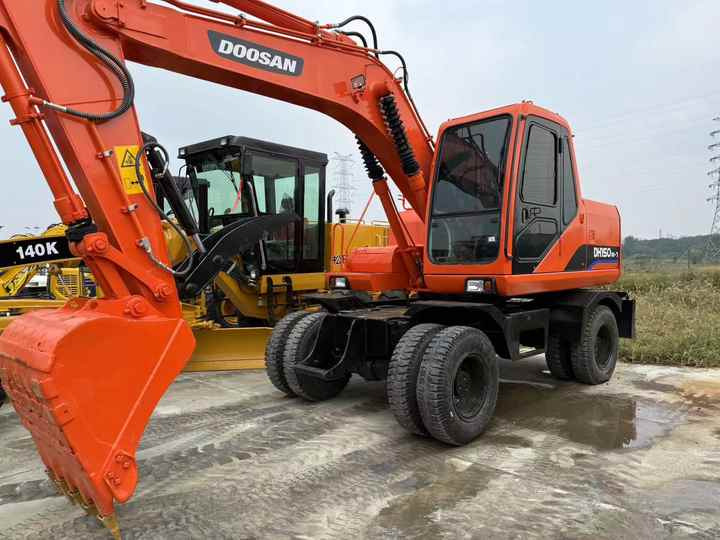 90% Brand New Doosan Brand Dh150w-7 Wheel Excavator in Stock Used Korea Brand Doosan Dh55 Dh60 Dh150 Dh210 Excavator for Sale - Bager točkaš: slika 2 90% Brand New Doosan Brand Dh150w-7 Wheel Excavator in Stock Used Korea Brand Doosan Dh55 Dh60 Dh150 Dh210 Excavator for Sale - Bager točkaš: slika 2