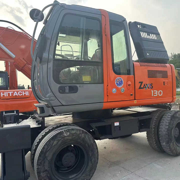 Hot Sale! Used Hitachi ZX130 Wheel Excavator |Excellent Condition| Best Price | Perfect for Construction & Road Projects - Bager točkaš: slika 1 Hot Sale! Used Hitachi ZX130 Wheel Excavator |Excellent Condition| Best Price | Perfect for Construction & Road Projects - Bager točkaš: slika 1
